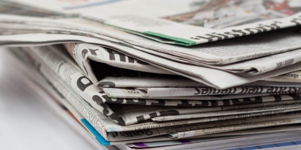 Do Newspapers and Magazines Compete?